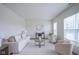 Inviting living room boasts neutral decor, contemporary furnishings, and hardwood floors at 9728 Junction, Fishers, IN 46037