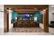 Luxurious building lounge with a bar, stools, and coffee station at 9728 Junction, Fishers, IN 46037