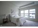 Spacious main bedroom with large windows, tray ceiling, and neutral decor at 9728 Junction, Fishers, IN 46037