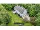 Overhead view of a sprawling estate with lush green lawns and mature trees at 9985 Ford Valley Ln, Zionsville, IN 46077
