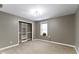 Bedroom featuring a closet, window, and neutral paint and carpeting at 9985 Ford Valley Ln, Zionsville, IN 46077