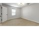 Bedroom with neutral carpet, white trim, and natural light at 9985 Ford Valley Ln, Zionsville, IN 46077
