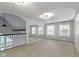 Bonus room with carpet, large mirror, and bright windows at 9985 Ford Valley Ln, Zionsville, IN 46077