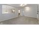 Bonus room with carpet and view of adjacent room at 9985 Ford Valley Ln, Zionsville, IN 46077
