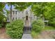 Charming home featuring stone accents, well-maintained landscaping, and inviting entrance stairs at 9985 Ford Valley Ln, Zionsville, IN 46077