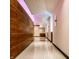 Modern office hallway featuring polished floors and accent lighting at 1 Virginia Ave # 607, Indianapolis, IN 46204