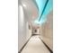 Bright office hallway with unique ceiling design and marble wall accents at 1 Virginia Ave # 607, Indianapolis, IN 46204