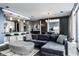 Open-concept living area with a view into the kitchen, comfortable seating, and stylish decor at 1 Virginia Ave # 607, Indianapolis, IN 46204