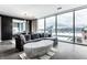 Stylish living room with city views, featuring a comfortable sofa and modern decor at 1 Virginia Ave # 607, Indianapolis, IN 46204