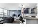 Open concept living area featuring breakfast bar and kitchen, and comfortable seating area at 1 Virginia Ave # 607, Indianapolis, IN 46204