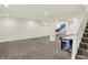 Finished basement with neutral carpet, recessed lighting, and an air hockey table at 10758 Gettysburg Pl, Carmel, IN 46032