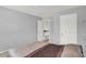 Spacious bedroom with neutral walls and carpet, and a large bed with a cozy comforter at 10758 Gettysburg Pl, Carmel, IN 46032