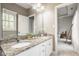Bathroom featuring double sink vanity with granite counters at 12505 Branford St, Carmel, IN 46032