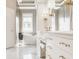 Elegant bathroom featuring a soaking tub, dual vanities, and luxurious finishes at 12505 Branford St, Carmel, IN 46032