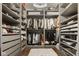Walk-in closet with custom shelving, drawers, and clothing racks at 12505 Branford St, Carmel, IN 46032