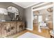 Tastefully decorated living area offering hardwood flooring, a view of the kitchen, and sophisticated decor at 12505 Branford St, Carmel, IN 46032