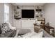 Comfortable living room with custom built-ins, modern decor, and relaxing seating at 12505 Branford St, Carmel, IN 46032