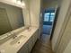 Bathroom featuring double vanity, quartz countertop, and ample space at 13646 Grand Abbey Way, Fishers, IN 46037
