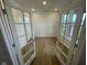 Home office with french doors and bright windows providing an open atmosphere at 13646 Grand Abbey Way, Fishers, IN 46037