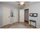 Bedroom with ceiling fan, three closets and base molding at 1415 Section St, Plainfield, IN 46168