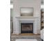 Elegant fireplace with a decorative mantel and a cozy ambiance at 14892 Higgins Dr, Westfield, IN 46074