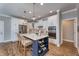 Stylish kitchen boasts a central island with seating, stainless steel appliances, and ample cabinetry at 14892 Higgins Dr, Westfield, IN 46074