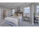 Spacious main bedroom with a large bed, side tables, and windows providing ample natural light at 14892 Higgins Dr, Westfield, IN 46074