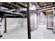 Unfinished basement with updated utilities, vapor barrier, and painted foundation at 1531 English Ave, Indianapolis, IN 46201