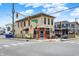 Two-story building with a tan exterior, located on a corner with an outdoor seating area at 1531 English Ave, Indianapolis, IN 46201