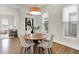 Bright dining area featuring a modern light fixture, and an open concept layout at 1531 English Ave, Indianapolis, IN 46201