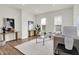 Bright living room featuring hardwood floors, stylish furniture, and natural light at 1531 English Ave, Indianapolis, IN 46201