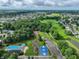 Aerial view of community amenities featuring a pool, tennis courts, and playground at 15460 Follow Dr, Noblesville, IN 46060