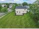 Spacious backyard featuring a well maintained lawn, a patio, and lush landscaping at 15460 Follow Dr, Noblesville, IN 46060