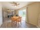 Bright kitchen and breakfast nook offers stainless appliances, wood-look floors, and patio access at 15460 Follow Dr, Noblesville, IN 46060