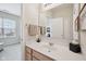 Neutral bathroom showcasing a vanity with a white sink, a large mirror, and a towel rack at 15553 Portland Dr, Westfield, IN 46074