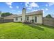 Spacious backyard with a patio and seating area, perfect for outdoor entertaining at 1896 Central Park W Blvd, Greenwood, IN 46143