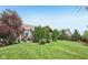 Mature trees landscape a large grassy backyard at 19281 Scofield Ridge Blvd, Westfield, IN 46074