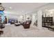 Spacious basement with comfortable seating, a scenic mural and stylish decor for a cozy retreat at 19281 Scofield Ridge Blvd, Westfield, IN 46074