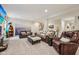 Expansive basement featuring comfortable seating, decorative wall accents, and cozy ambiance at 19281 Scofield Ridge Blvd, Westfield, IN 46074