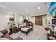 Open basement layout with ample seating, rustic doors, and stylish decor for relaxation at 19281 Scofield Ridge Blvd, Westfield, IN 46074