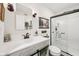 Stylish bathroom with sleek white vanity, sink, updated fixtures, and a glass-enclosed shower at 19281 Scofield Ridge Blvd, Westfield, IN 46074