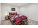 Cozy bedroom features a full-sized bed with unique, rustic themed bedding and decor at 19281 Scofield Ridge Blvd, Westfield, IN 46074