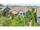 Aerial view showcases the backyard with an outdoor lounge area and lush trees at 19281 Scofield Ridge Blvd, Westfield, IN 46074