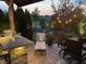 Back patio featuring an outdoor kitchen area with grill, bar, and a lounge chair with decorative pillows at 19281 Scofield Ridge Blvd, Westfield, IN 46074