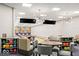 Entertainment space with bowling alley, seating area, and modern lighting fixtures at 20005 Gansett Rd, Westfield, IN 46074