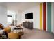 Fun bonus room with colorful accents, a large TV, and comfortable seating at 20005 Gansett Rd, Westfield, IN 46074
