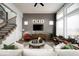 Bright living room featuring large windows, a modern fireplace, and comfortable seating at 20005 Gansett Rd, Westfield, IN 46074