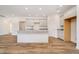 Modern kitchen featuring granite countertops and a central island at 202 Asbury Dr, Anderson, IN 46013