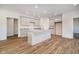 Modern kitchen featuring stainless steel appliances, granite countertops, and a central island at 202 Asbury Dr, Anderson, IN 46013