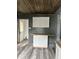 Cozy kitchen area with wooden countertop and white cabinets at 2244 Lafayette St, Anderson, IN 46012